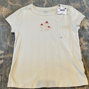 American Eagle Cream T-Shirt with Floral Design